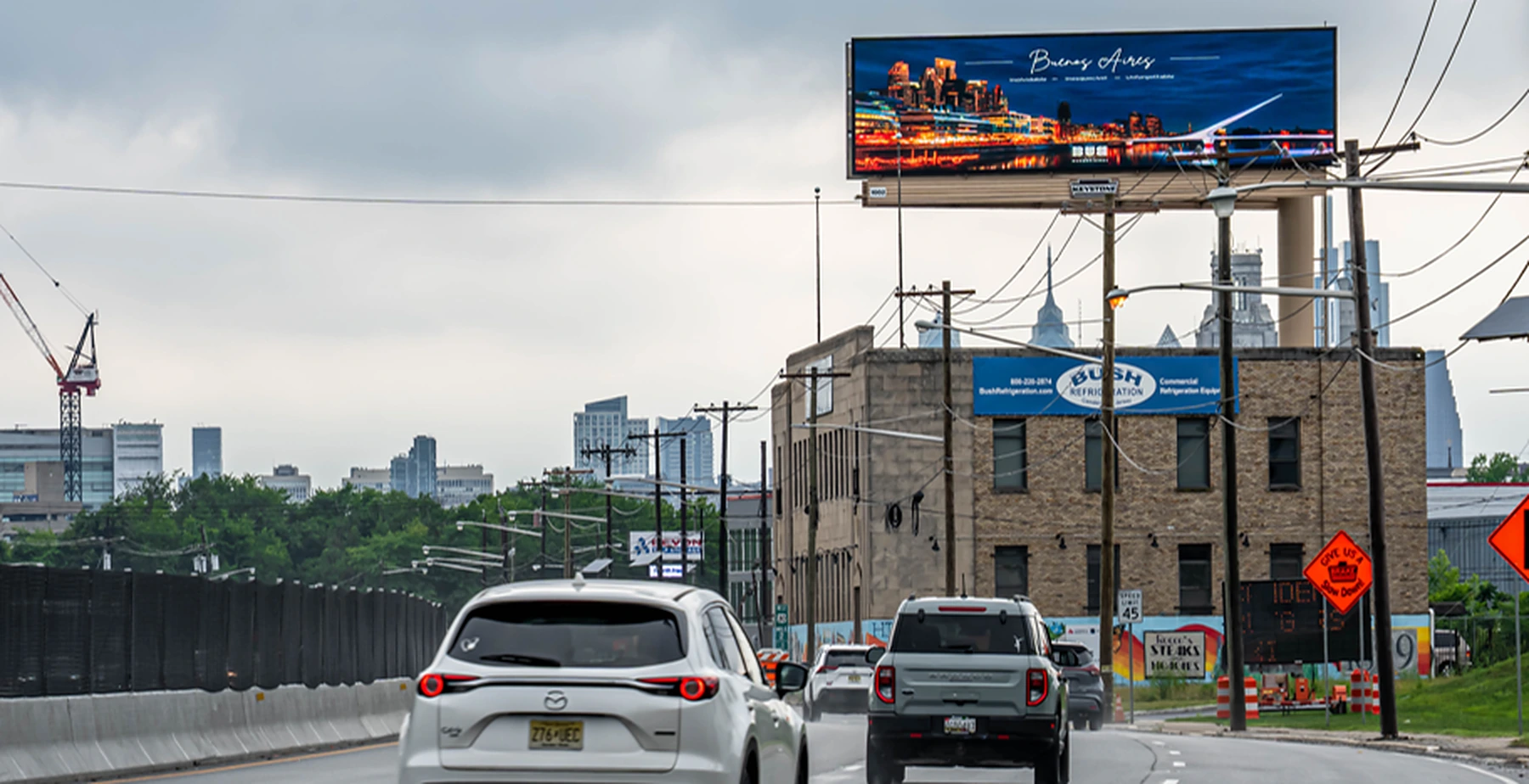 Digital billboard on I-76 Passyunk with the Philadelphia skyline
